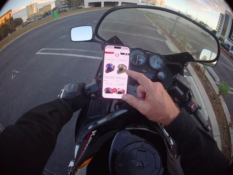 Motorcycle helmets displayed by a retailer opened from RiderShield Marketplace.